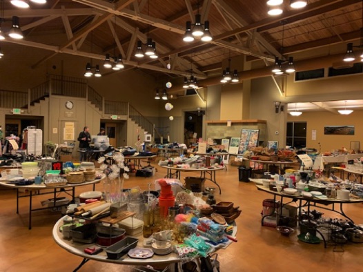 Final set up for the Giant Indoor Yard Sale, the Club's primary fundraiser.